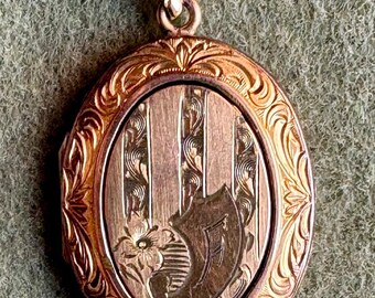 A Vintage Gold Filled Locket by A&Z Jewelers of Providence Rhode Island
