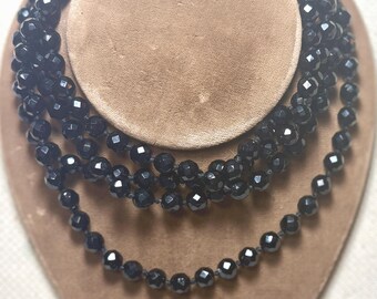 A Vintage Opera Length Necklace of Individually Knotted Black Austrian Crystals