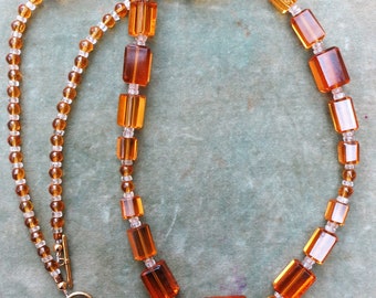 A Vintage Necklace in Amber Glass Geometric Beads