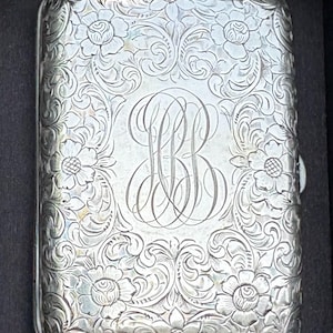 An Antique Sterling Silver Cigarette Case