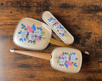Vintage three piece dressing table vanity set, 1950’s floral hand held mirror, hairbrush and clothes brush, retro boudoir decor