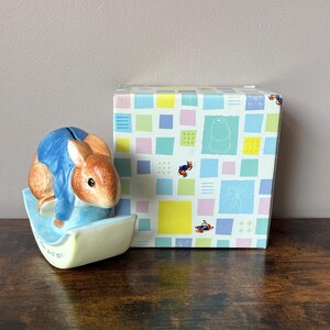 Vintage Peter Rabbit rocking money box from the world of Beatrix Potter, with the original box