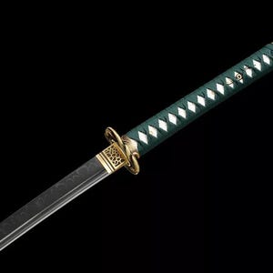 May include: A Japanese-style sword with a dark blade and a green handle wrapped in a diamond pattern. The hilt features gold-colored accents and a decorative guard. The sword is set against a black background.