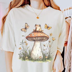 Whimsical Mushroom Frog Comfort Colors Tshirt | Cute Boho Frog Tee | Fairycore Mushroom Shirt | Gift for Nature Lover | Watercolor Frog Tee