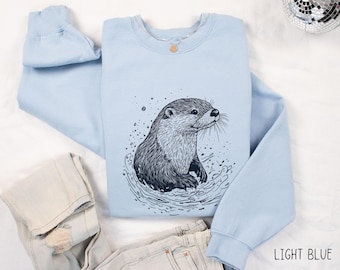 Bonita sudadera bohemia de verano con nutria marina, camiseta con animales del océano, camiseta con dibujo lineal, adorable suéter de verano con nutria marina acuática.