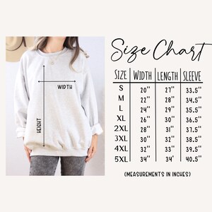 May include: A light gray sweatshirt with a size chart. The chart lists measurements in inches for width, length, and sleeve length, ranging from size small to 5XL. The text "Size Chart" is written in cursive.
