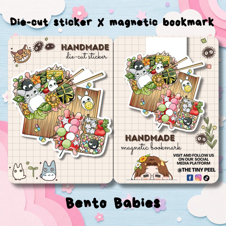 May include: A die-cut sticker and a magnetic bookmark featuring bento box illustrations with cartoon characters, colorful food items, and chopsticks. The items are displayed on grid-patterned backing cards with text including Bento Babies.