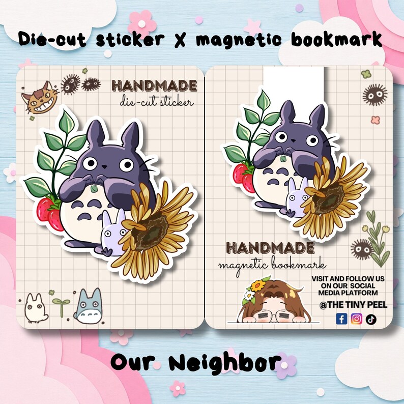 May include: A die-cut sticker and a magnetic bookmark featuring a purple creature with white belly markings, a small white creature, a sunflower, and green leaves. The items are displayed on grid-patterned cards with text including HANDMADE.