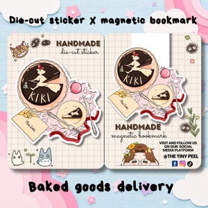 May include: A die-cut sticker and a magnetic bookmark set featuring a chocolate cake with a silhouette of a character on a broomstick, a slice of cake on a plate, a fork, a knife, a yellow envelope, and small soot sprites on a grid background.