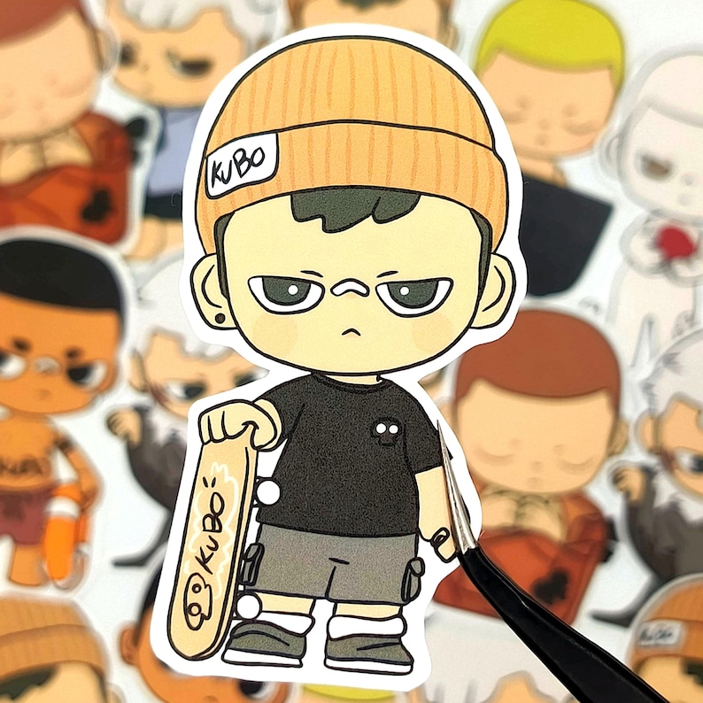 May include: A sticker featuring a cartoon character with an orange beanie, black t-shirt, and gray shorts. The character holds a skateboard with the text "KuBo". The sticker is surrounded by other similar cartoon stickers.