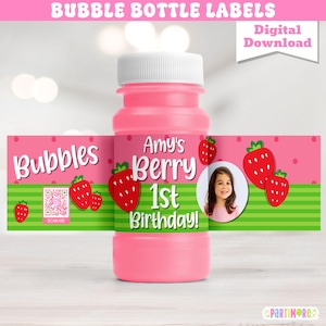 May include: A pink bubble bottle with a label that reads "Amy's Berry 1st Birthday!" and "Bubbles." The label features strawberries and a photo of a child. The words "Digital Download" are also visible.