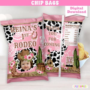 May include: Pink chip bags with a cowgirl theme. One bag says "Reina's 1st Rodeo" with a photo of a baby, a cowboy hat, and a boot. The other bag says "Thank You For Coming". The bags have a black and white cow print design.