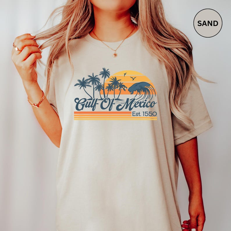 a woman wearing a shirt that says gulf of mexico