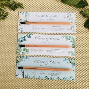 May include: Three wedding favor cards with a watercolor floral design. Each card features a pencil with embedded seeds and the text "Let Love Grow". The cards also include the names "Oliver & Claire" and the date "20 April 2024".