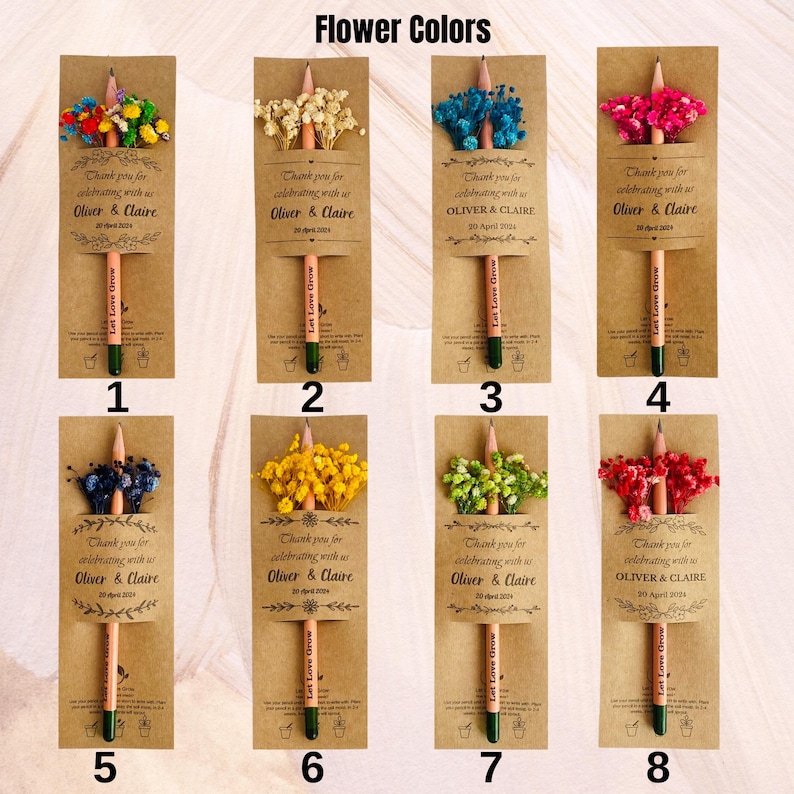 May include: A collection of eight pencils with attached dried flower bouquets in various colors. Each pencil is packaged with a brown card that includes the text "Thank you for celebrating with us Oliver & Claire" and "Let Love Grow."