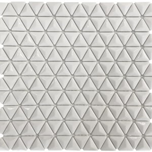 May include: White ceramic tile mosaic with a geometric pattern of triangular shapes. The tiles have a glossy finish and a slightly raised texture.
