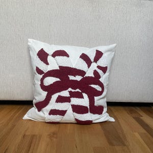 Weihnachts-Kissenbezug mit Zuckerstangen/Schleifen-Motiv – festliche Deko & perfektes Geschenk für Deko-Liebhaber