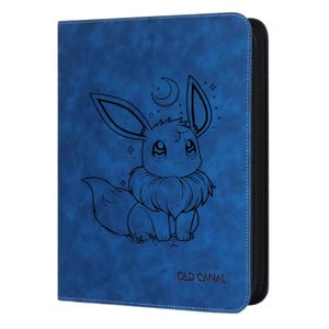 Pode incluir: Um fichário azul com um desenho a traço preto de um personagem de desenho animado com orelhas grandes, um pescoço fofo e uma lua crescente. O texto "OLD CANAL" está impresso na parte inferior. O fichário tem um zíper preto e costuras brancas.