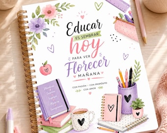 May include: A spiral-bound notebook with a floral design and the words "Educar es sembrar hoy para ver florecer mañana." Additional notebooks, a mug with a heart, and pens are also visible. The notebook has a gold spiral binding.
