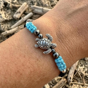 the ocean soul bracelet | sterling silver sea turtle + blue + black macramé | waterproof + adjustable