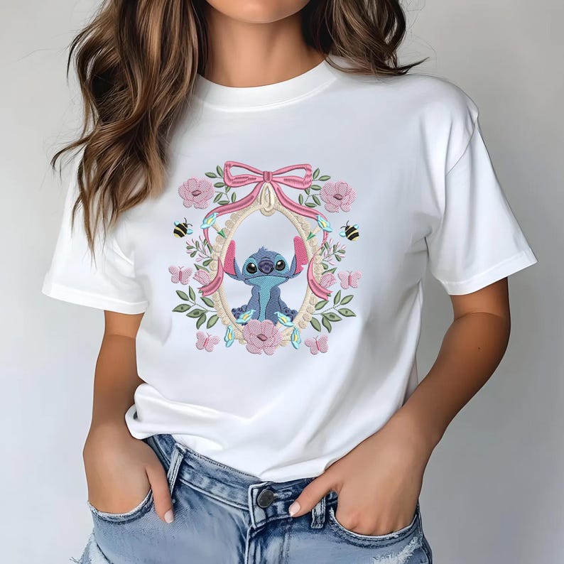a woman wearing a white t - shirt with a stitched stitch stitch stitch stitch