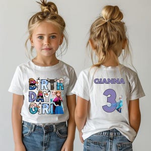 A young girl wearing a white t-shirt with a birthday girl design and the name Gianna printed on the back.