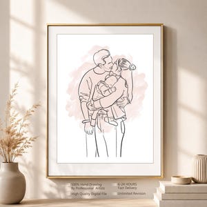 Op de afbeelding: Een ingelijste lijntekening van een gezin van drie, met een ouder die de andere ouder kust terwijl deze een baby vasthoudt. De tekening gebruikt zwarte lijnen op een witte achtergrond met een zachtroze aquarel-achtige vlek achter de figuren.