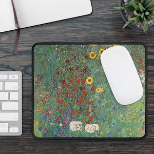 May include: A mouse pad featuring a colorful floral design with a variety of flowers, including sunflowers, poppies, and daisies. The design is reminiscent of a famous painting.
