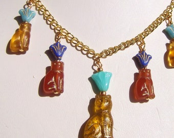 Egyptian Revival Gold and Carnelian Glass Cat and Flower Charm Necklace