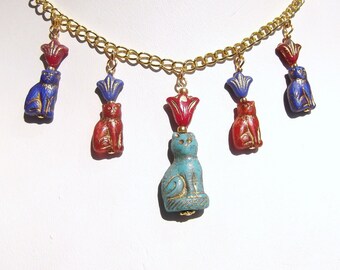 Egyptian Revival Turquoise Glass Cat and Flower Charm Necklace