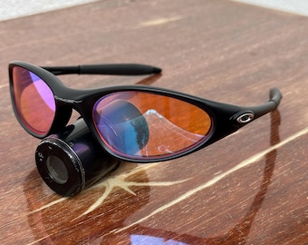 Rare Oakley Minute 1.0 Black and Purple Eye Jacket Redux Prizm