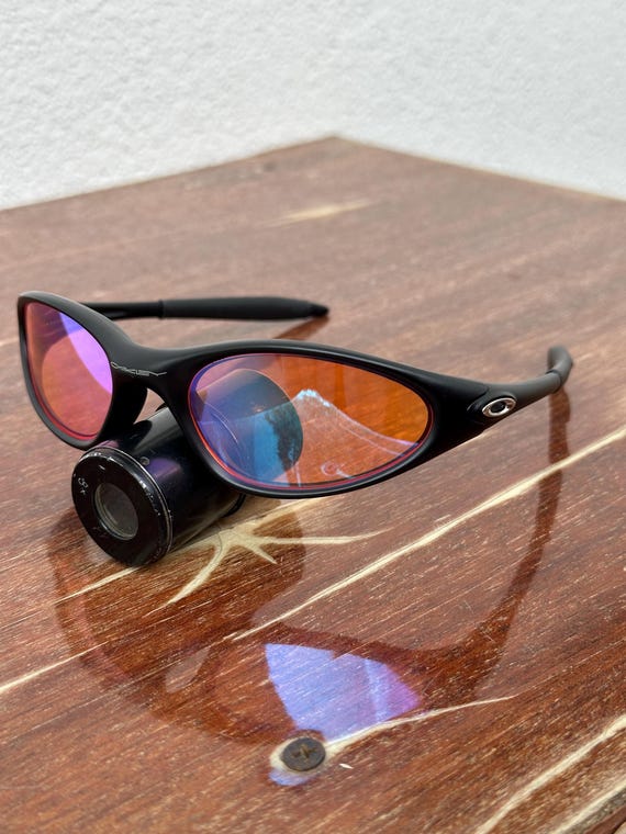 Rare Oakley Minute 1.0 Black and Purple Eye Jacket Redux Prizm