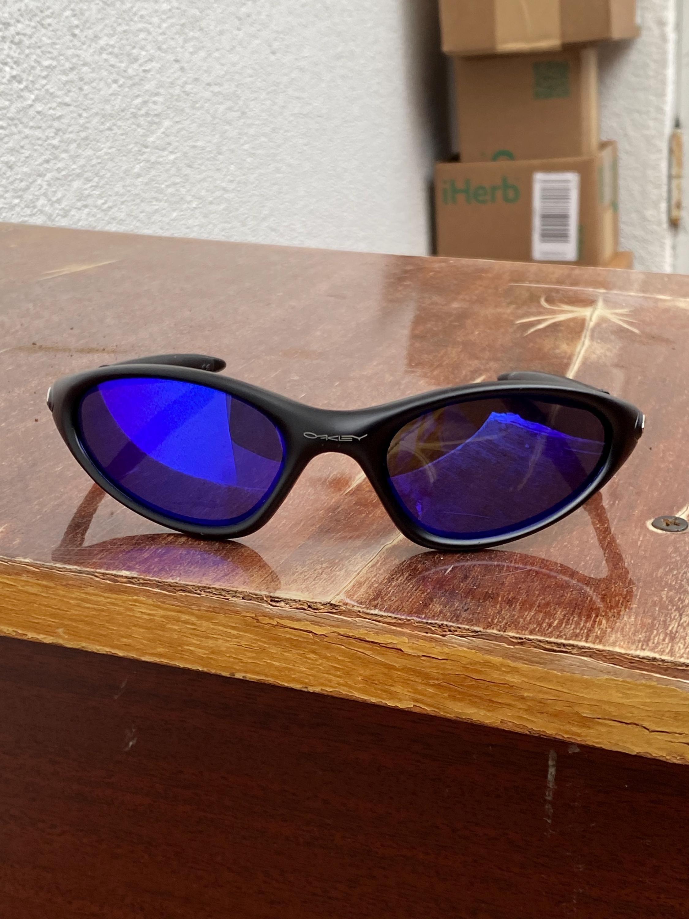 Oakley Minute 1.0 Black and Blue Eye Jacket Redux Prizm