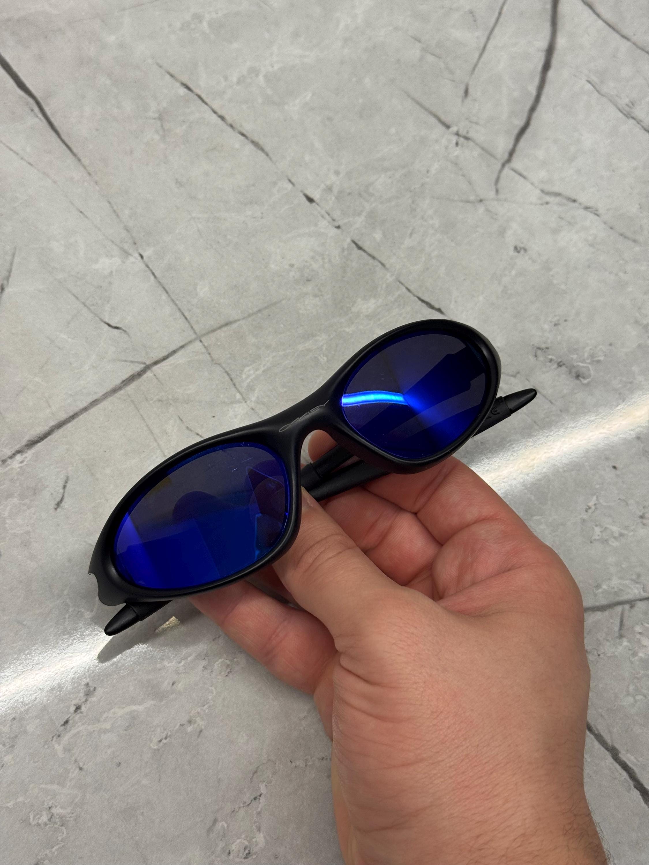 Oakley Minute 1.0 Black and Blue Eye Jacket Redux Prizm Iridium