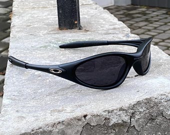 Солнцезащитные очки Oakley Minute 1.0 Black Eye Jacket Redux Prizm