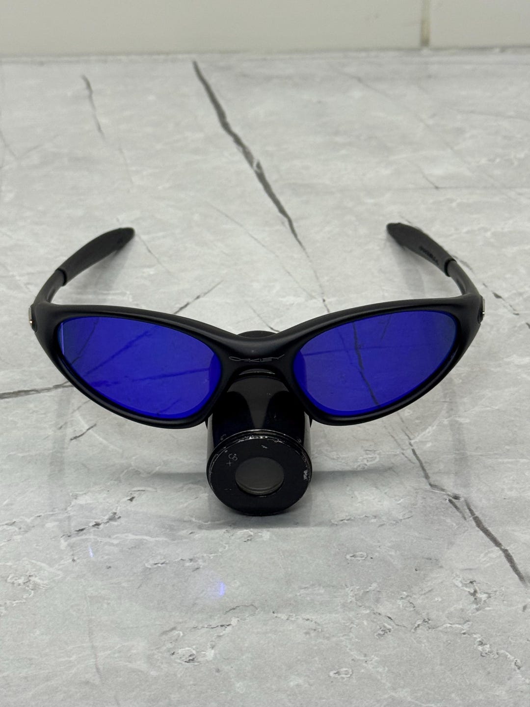 Oakley Minute 1.0 Black and Blue Eye Jacket Redux Prizm Iridium