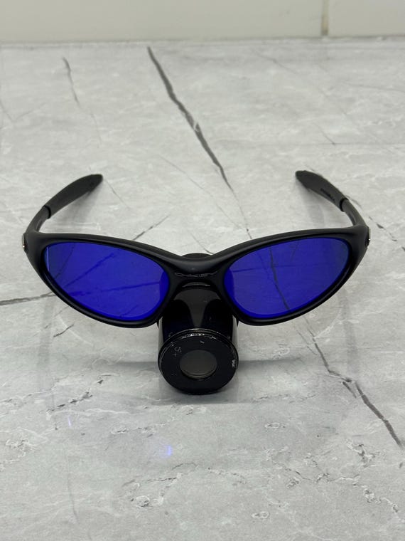 Oakley Minute 1.0 Black and Blue Eye Jacket Redux Prizm Iridium