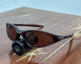 Bekijk alle Oakley Minute 1.0 Brown Eye Jacket Redux Prizm Iridium heren Y2K vintage plaat jaren 90 gepolariseerd