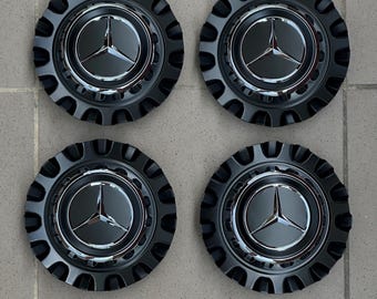 Zestaw 4 oryginalnych emblematów na piastę koła Mercedes Benz W167 X290 X247 X167 AMG GT 00040069007756 NOWY Gt Class Black Chrome Star