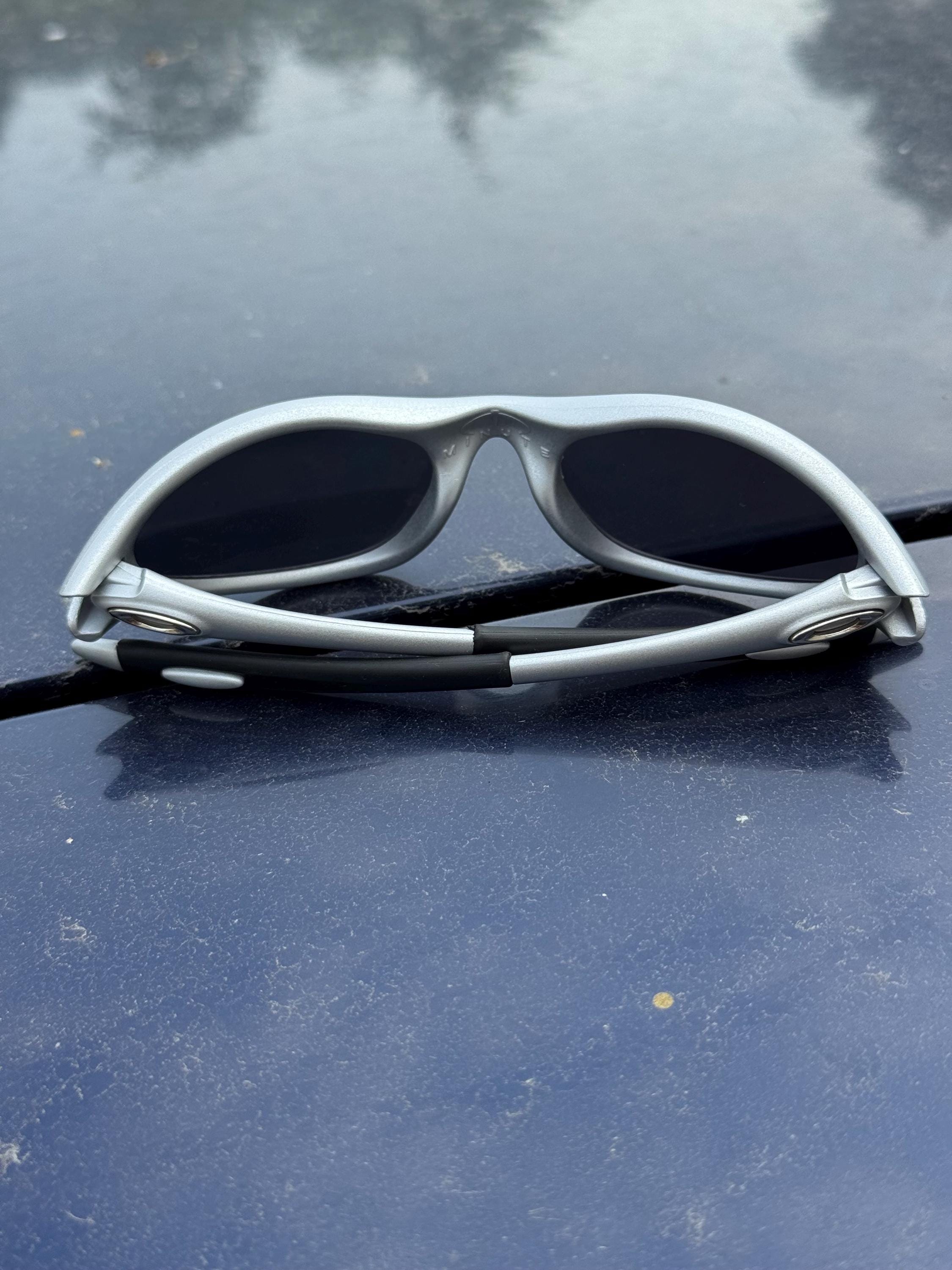 Oakley Minute 1.0 Black and Gray Eye Jacket Redux Prizm Iridium