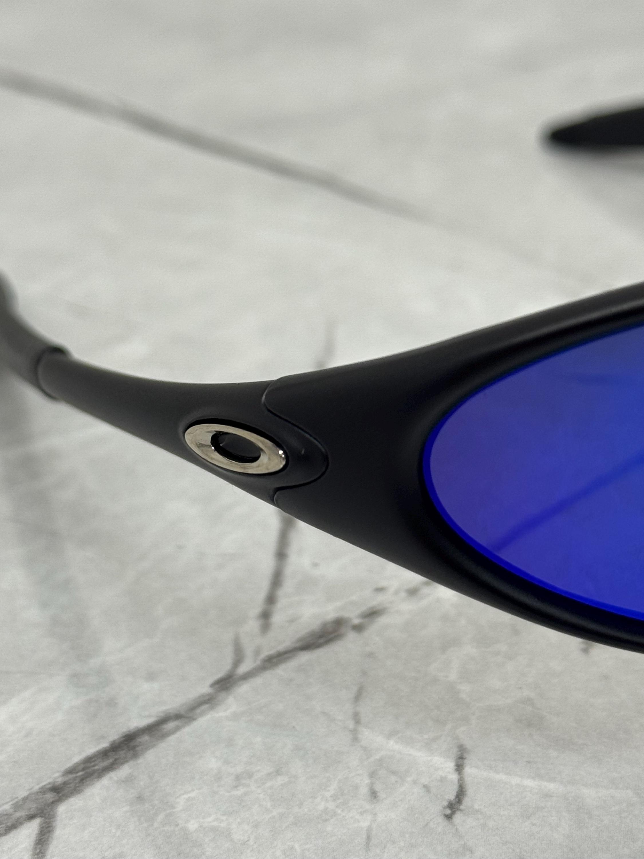 Oakley Minute 1.0 Black and Blue Eye Jacket Redux Prizm Iridium