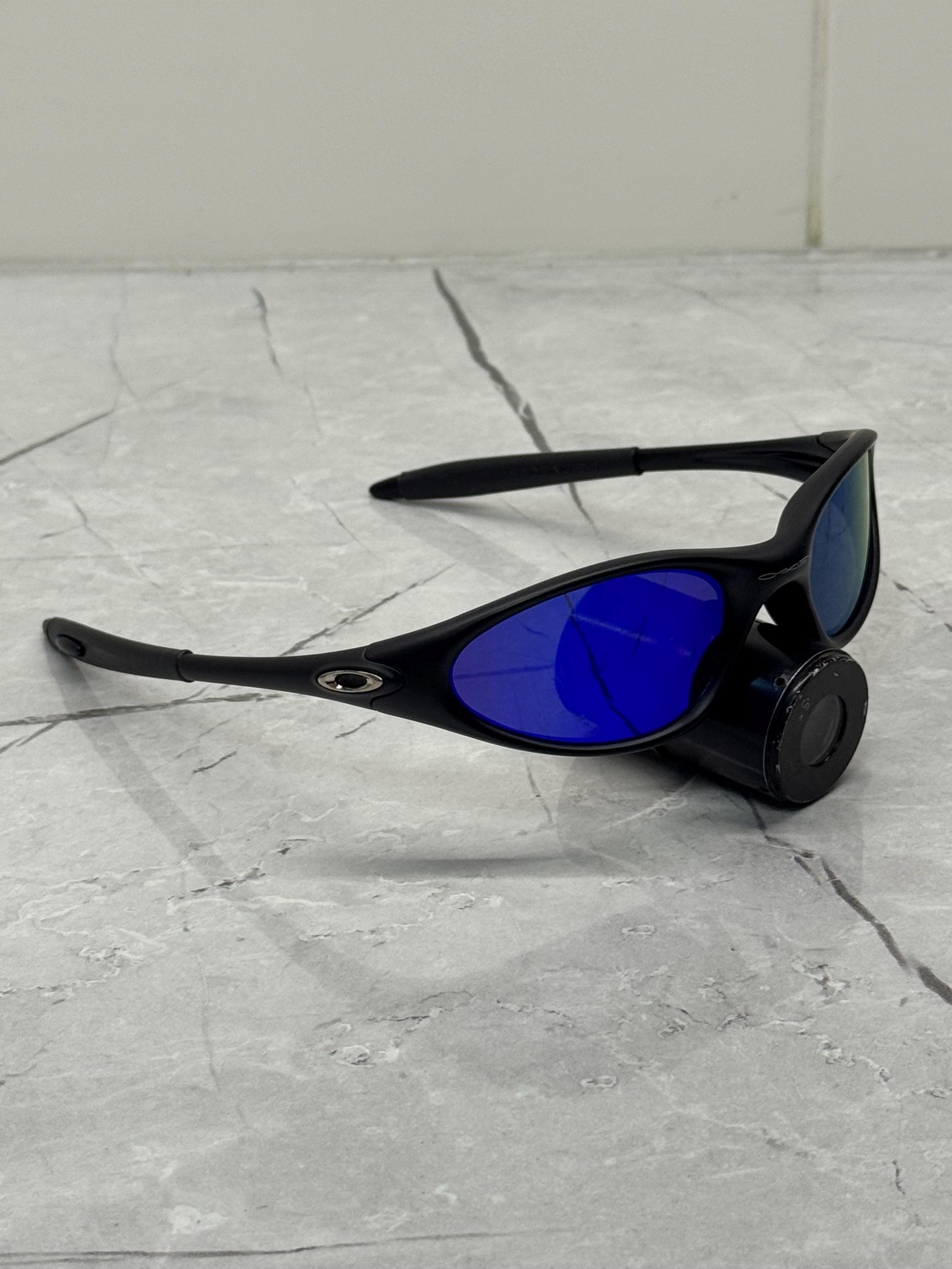 Oakley Minute 1.0 Black and Blue Eye Jacket Redux Prizm Iridium