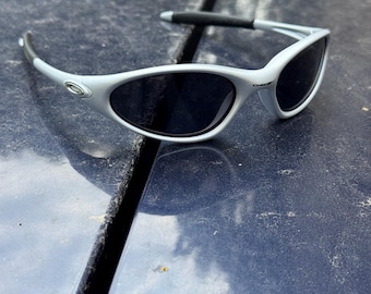Oakley Minute 1.0 Black and Gray Eye Jacket Redux Prizm Iridium