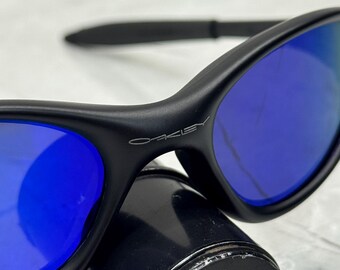 Oakley Minute 1.0 Black and Blue Eye Jacket Redux Prizm Iridium