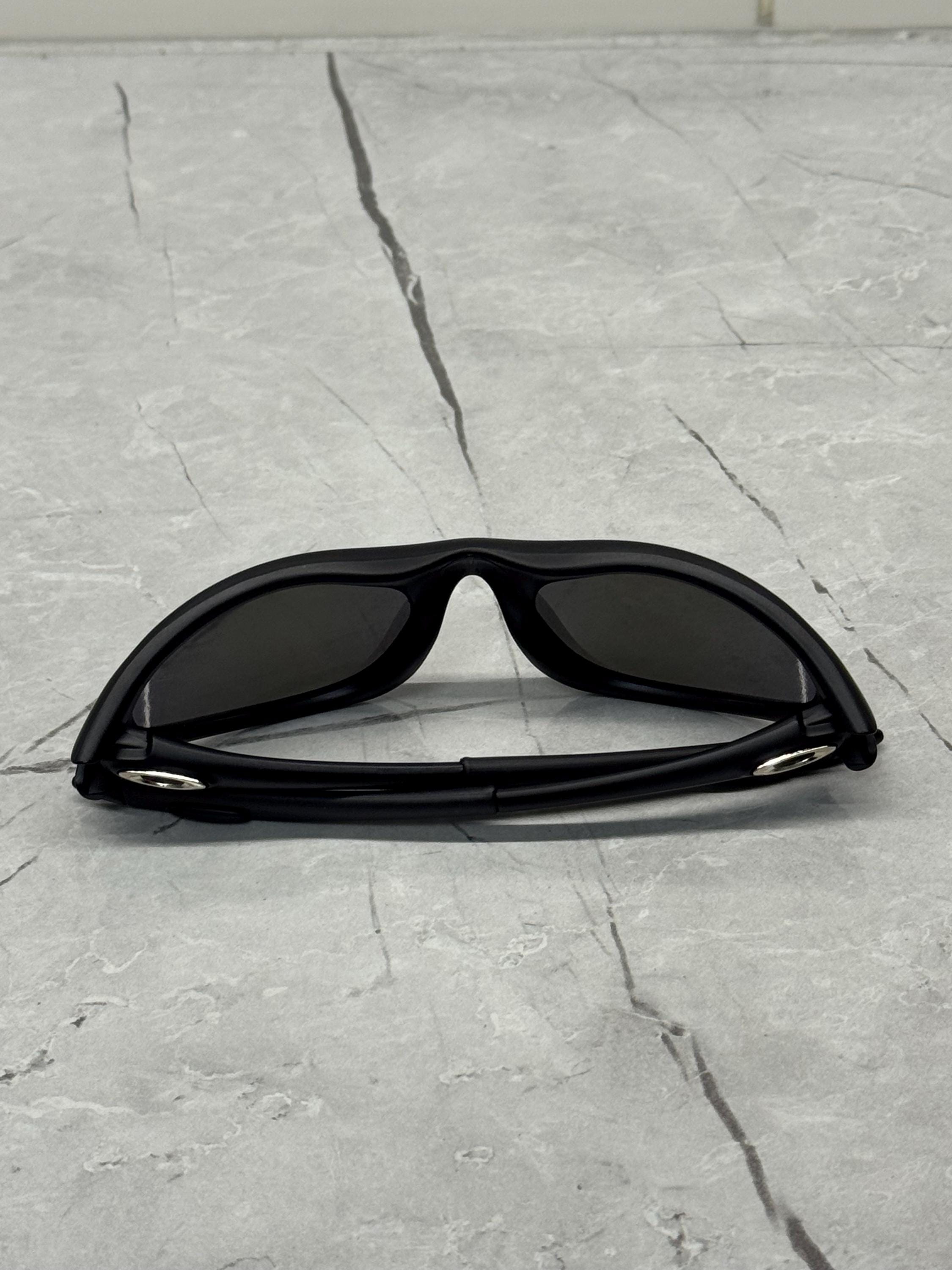 Oakley Minute 1.0 Black and Blue Eye Jacket Redux Prizm Iridium
