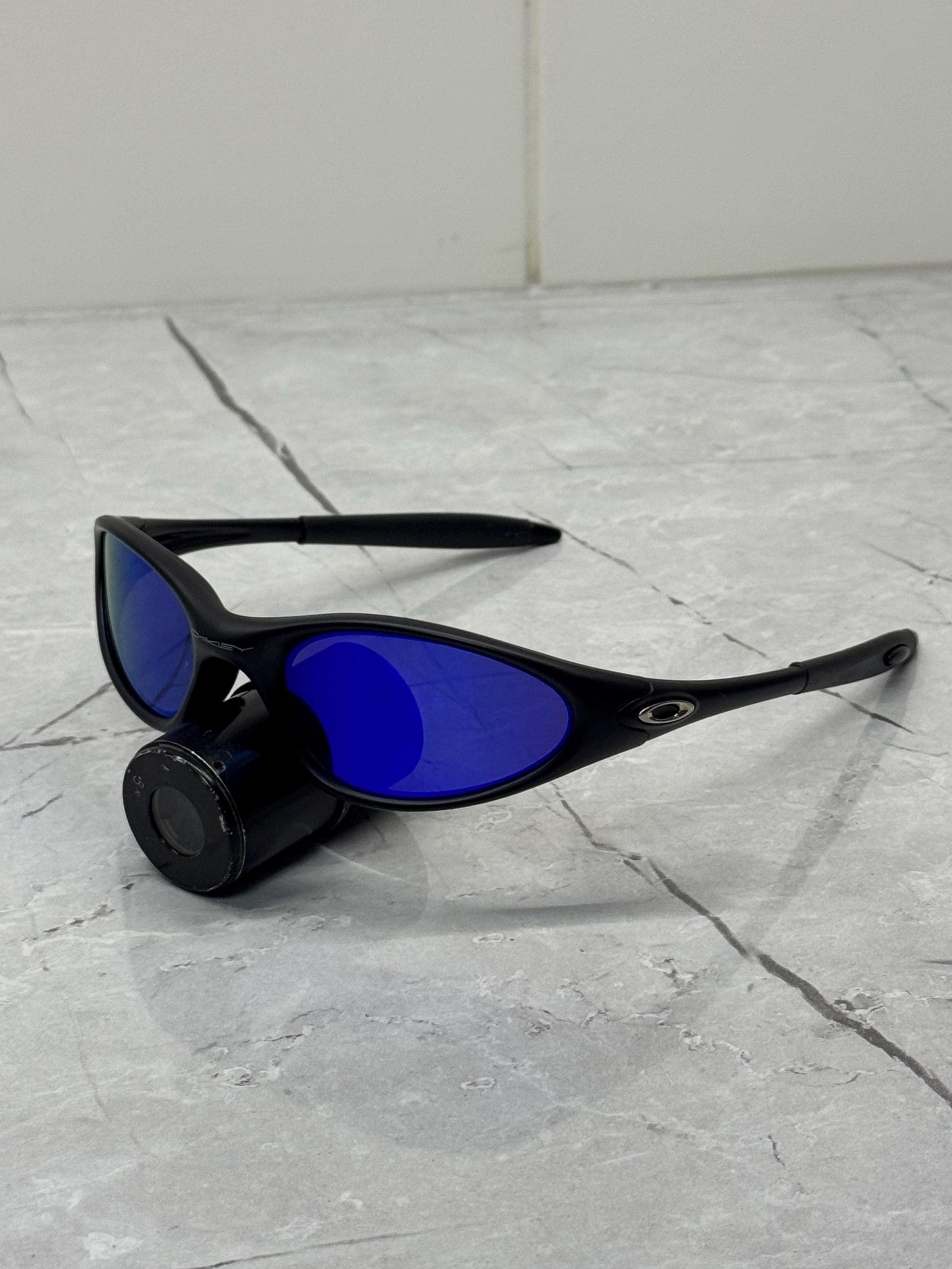Oakley Minute 1.0 Black and Blue Eye Jacket Redux Prizm Iridium