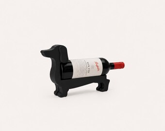 Adorable dachshund-style wine bottle holder. Perfect decorative piece for wine lovers.