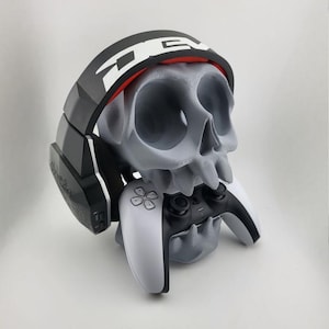 Skull headset and game controller stand.