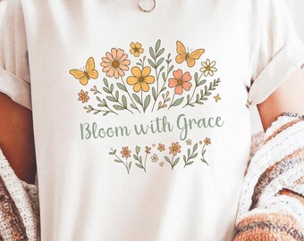 Camiseta cristiana con estampado floral, camiseta inspirada en la fe con flores silvestres, camiseta con diseño botánico de gracia.