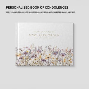 Puede incluir: Un libro de condolencias personalizado con el texto "in loving memory of MARY LOUISE WILSON" y fechas. La portada presenta un diseño floral con flores moradas, amarillas y blancas.